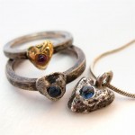 Ruby and sapphire cabochons set in 18 kt. gold and sterling silver. Lumpy Hearts