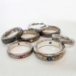 Sterling silver stacking rings set with diamonds, rubies and sapphires