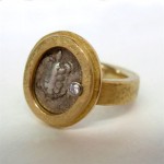 Ancient Greek coin and diamond set in 19 kt. white and 18 kt. yellow gold. Sea Turtle ring
