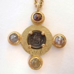 Ancient Greek coin and coloured rose cut diamonds set in 18 kt. gold. Pegasus coin pendant
