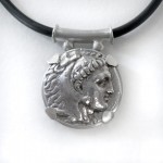 ancient greek coin of alexander the great set in sterling silver on a leather cord