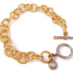 18 karat yellow and 19 white gold handmade chain bracelet set with diamonds
