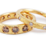 18 karat gold and 19 karat white gold set with colourless or champagne diamonds.
