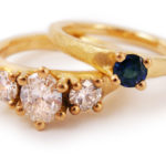 Diamonds and sapphires in beaten gold.