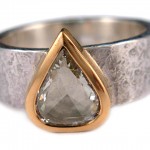 Rose cut pear shape diamond set in 22 karat and sterling silver