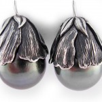 Black Tahitian pearls set in sterling silver.